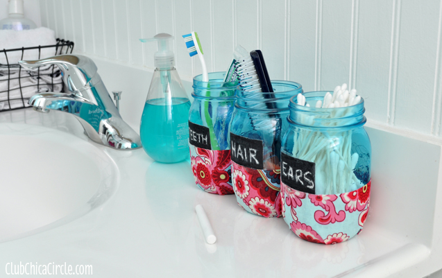 Bathroom-Organizer-Mason-Jars-Tween-craft - Mason jars used for teeth hair and ears product organization on sink