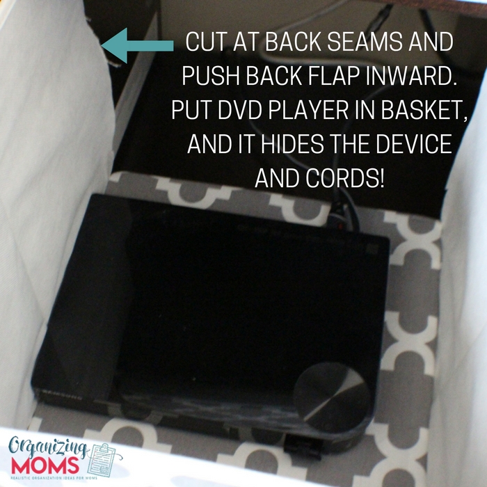 Cut back seams of a storage cube to house DVD player.