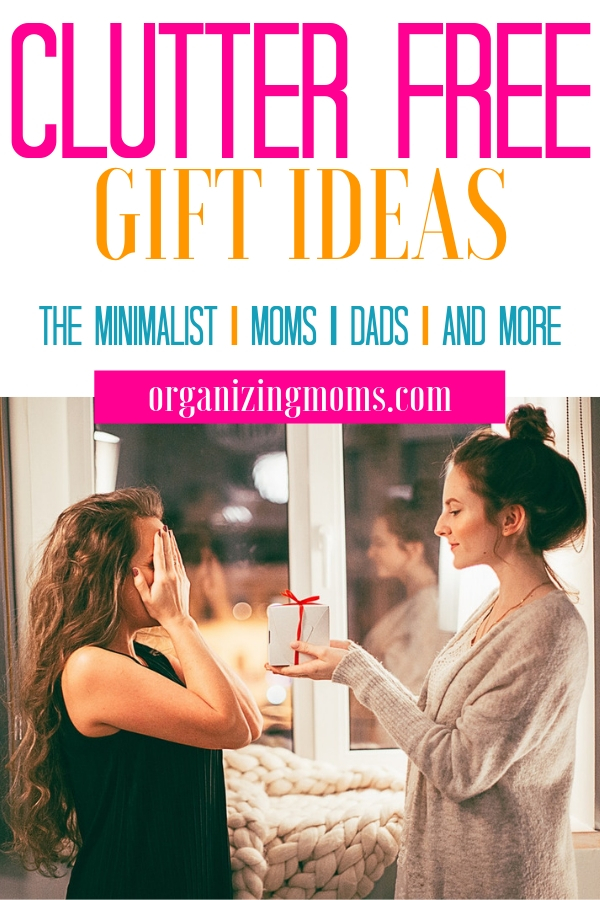 Text - Clutter Free Gift Ideas The Minimalist | Mom | Dads | And More organizingmoms.com. Image of woman giving a gift to another woman who is covering her eyes.