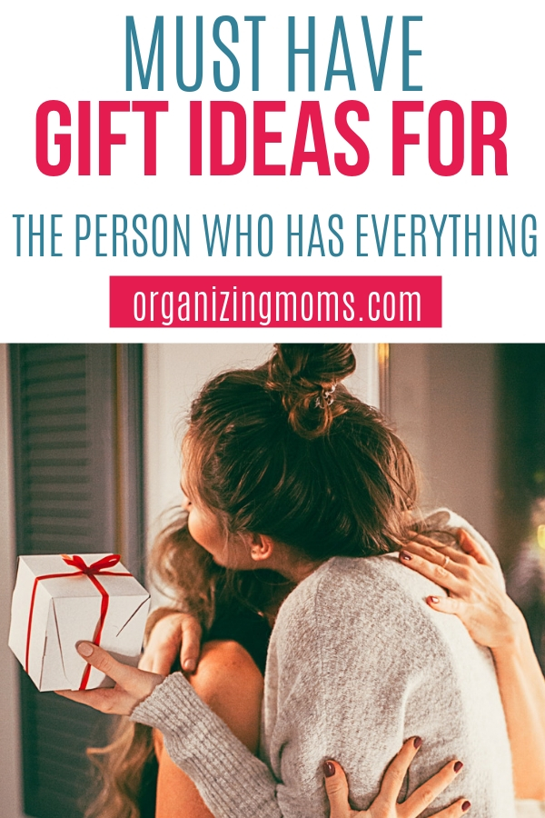 Text - Gift Ideas for the person who has everything organizingmoms.com . Image of girls hugging and holding a gift.