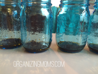 Homemade dressing in mason jars.