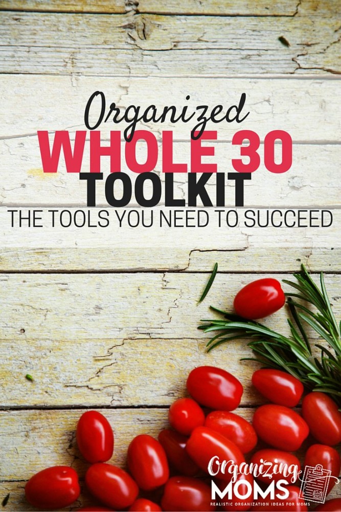 Text - Organized Whole30 Toolkit - The tools you need to succeed. Image of wooden table with grape tomatoes and herbs on table.