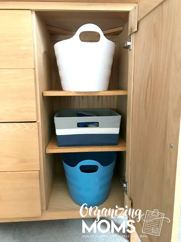Organized clothing cabinet. How to help your child organize clothes.