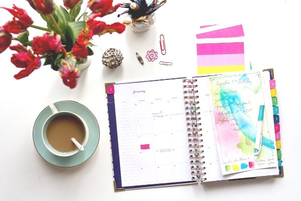 colorful planner and coffee