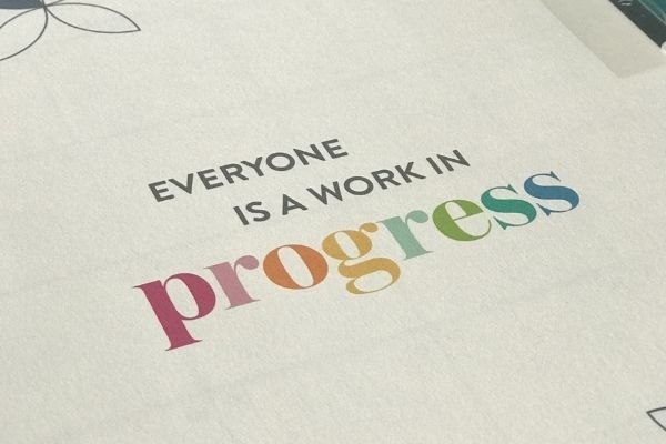 everyone is a work in progress erin condren life planner quote page