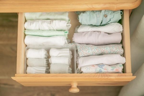 folded clothes in drawer