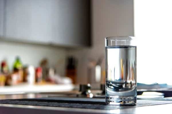 glass of water on counter in kitchen