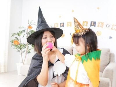 mom and preschooler dressed as witches to symbolize halloween party ideas for preschoolers