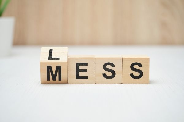 image text less mess. used to signify what is needed for how to declutter when overwhelmed