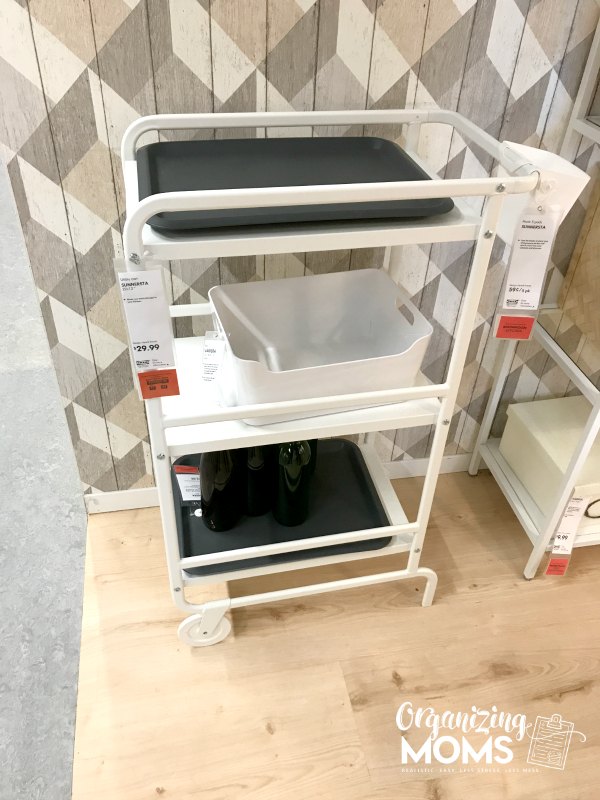 White IKEA cart on wooden floor