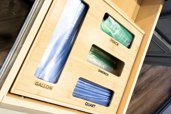 bamboo plastic bag organizer in kitchen drawer