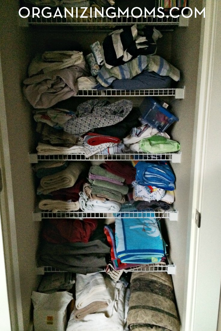 Linen closet organization before picture. Total chaos.