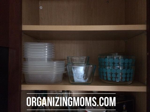 Leftover storage containers on bottom shelf