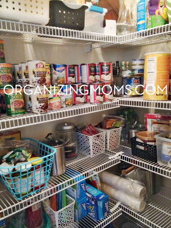 Pantry organized with bins. An easy solution to help get your pantry organized.