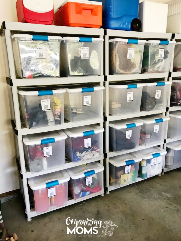 plastic bins labeled with pack n track codes