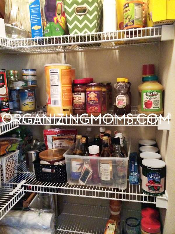 Like items are grouped together in this pantry organization project.