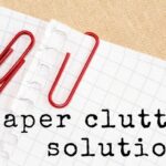 text paper clutter solutions graph paper with red paperclips