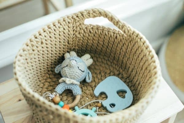 playroom basket with toys inside
