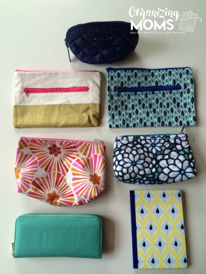 A group of pouches for a purse on a table