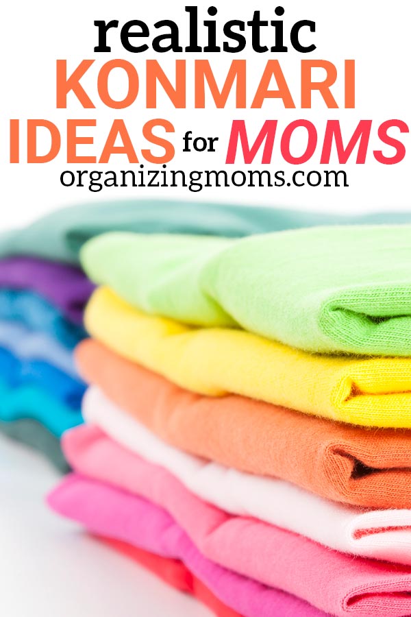 text - Realistic Konmari Ideas for Moms organizingmoms.com Image of colorful folded clothes, closeup