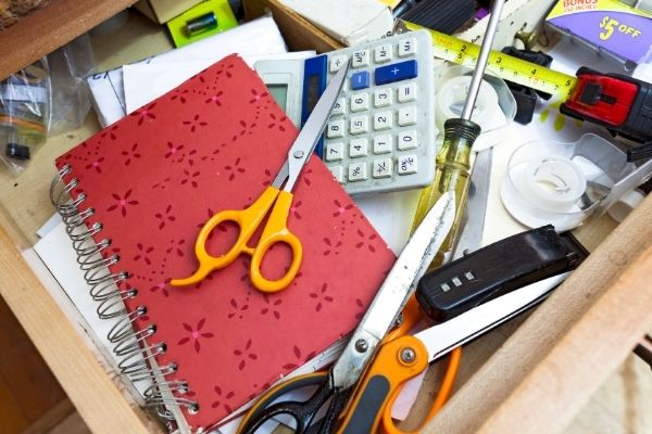 inside of junk drawer that needs to be decluttered