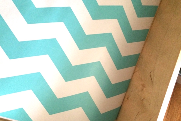 Close up of blue and white chevron striped spice drawer liner