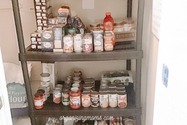 stocked pantry under stairs