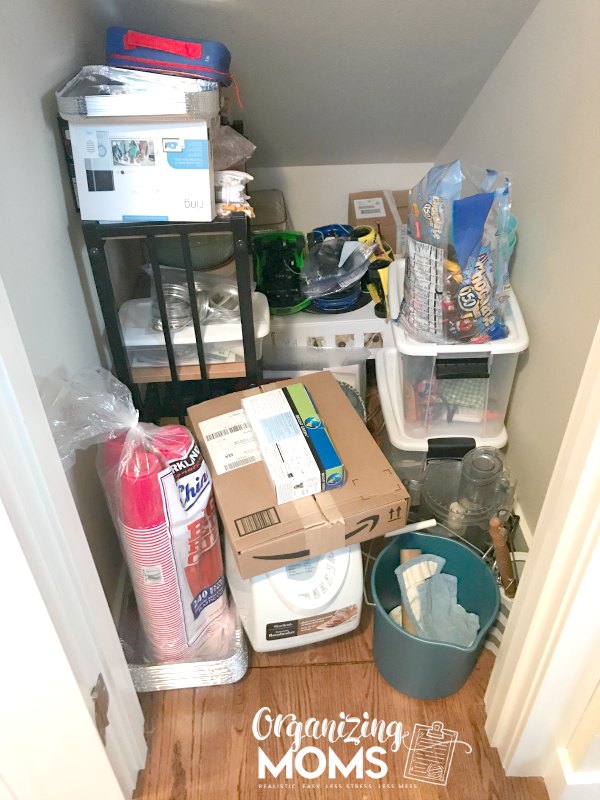 This under the stairs closet became a catch all for clutter. 