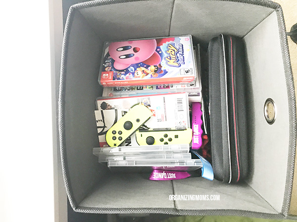 video games in fabric storage cube